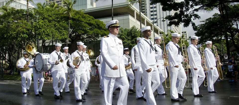 111218-N-RI884-097 HONOLULU (Dec. 18, 2011) The U.S. Pacific Fleet Marching Band participates in a parade through downtown Waikiki honoring Japanese-American veterans of World War II who recently received the Congressional Gold Medal. The medal was presented to members of the 442nd Regimental Combat Team, 100th Infantry Battalion, Military Intelligence Service and the 1399th Engineer Construction Battalion. (U.S. Navy photo by Mass Communication Specialist 2nd Class Daniel Barker/Released)
