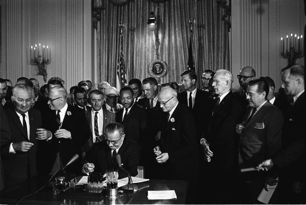 President LBJ Signing Executive Order 1964