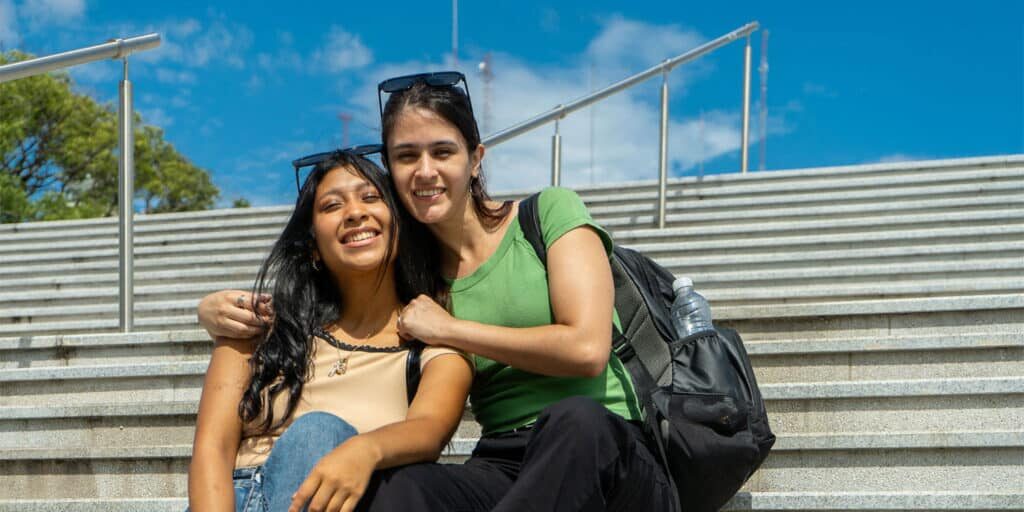 Two Students sitting on steps